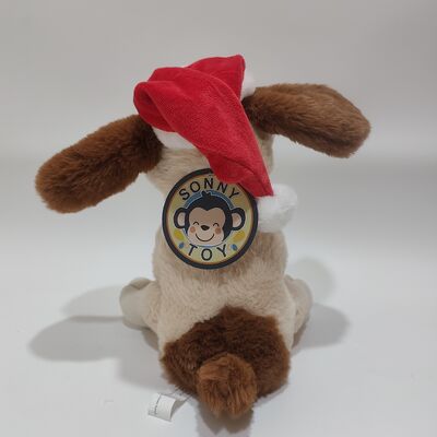 Musical menyanyikan anjing Natal dengan telinga bergerak